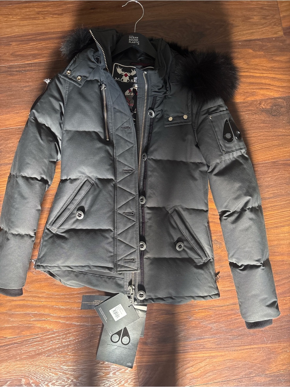 Moose Knuckles Black Women's Short Down Puffer Jacket with Fur-Trim Hood